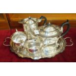 A four-piece silver plated tea service, a Selkirk Glass paperweight and two others.