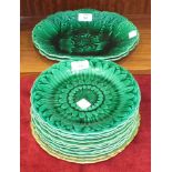 Ten Wedgwood green leaf pattern plates, 21.5cm diameter, two Wedgwood green shaped oval plates, 28 x