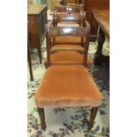 A set of six late-19th century mahogany Regency-style dining chairs on turned front legs, includes