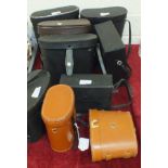 A collection of nine pairs of binoculars in cases, including 'The Plymothian' 10x40, Halina 20x50,