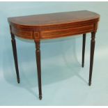A late-George-III inlaid mahogany fold-over card table, the top cross-banded with burr yew wood,