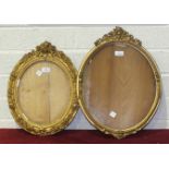 A 19th century gilt gesso oval picture frame, 50 x 40cm and another, 44 x 35cm, (2).