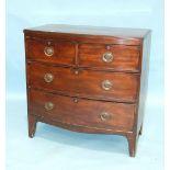 A late-Georgian mahogany bow-fronted chest of two short and two long cockbeaded drawers, on