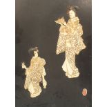 A late-19th/early-20th century Japanese ivory and lacquered panel depicting two female figures,