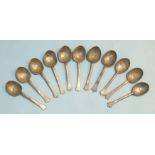 A collection of nine 17th century-style pewter trefid spoons with crowned rose touch mark to