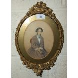 Victorian School portrait miniature of a young woman holding a book, three-quarter length,