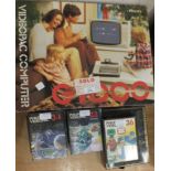 A boxed, used, Philips G700 Videopac with thirteen boxed games, including Conquest of the World -