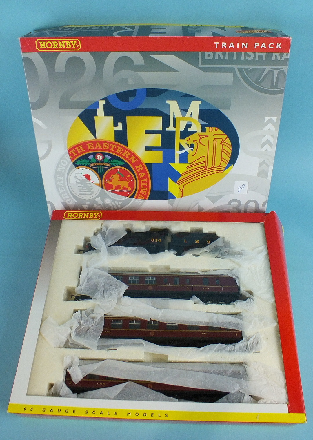 Hornby, 3015 train pack with R2172 LMS Fowler Class 2P 4-4-0 Locomotive and three coaches, boxed.