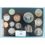 A Royal Mint 2009 12-coin Proof collection, including Kew Gardens 50p coin.