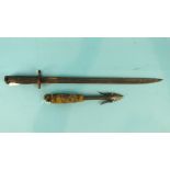 A 19th century iron harpoon head with hinged folding barbs and original rope binding with loop, 27cm