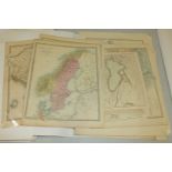A large collection of coloured unframed world atlas maps.