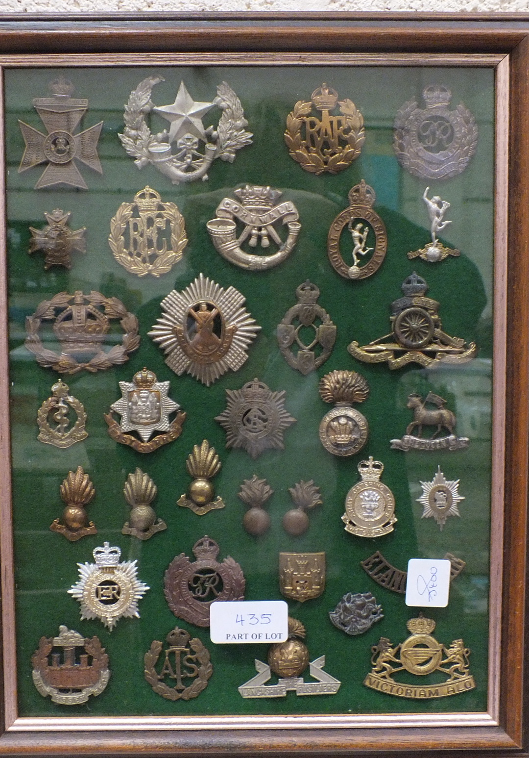 A collection of 117 various military badges contained in four glazed frames. - Image 3 of 4