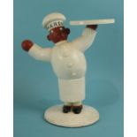 A plaster shop advertising figure of a baker in whites, his chef's hat inscribed 'MARSH', one hand