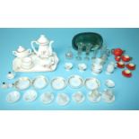 A collection of doll's house china and glass, including five wine glasses, two carafes, white