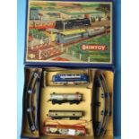 A Welsotoys Brimtoy battery-operated train set, comprising D5001 diesel, Esso tanker, open wagon,