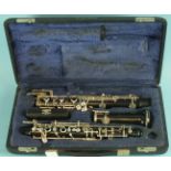 A Gebruder Moennig oboe, professional model with automatic octaves, no.2891, cased.
