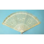 A 19th century Chinese carved ivory brisé fan, the guards carved with flowers and birds, the brisé