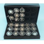 Twenty-three/twenty-nine Royal Mint silver 2011 Olympic Sports 50p pieces in presentation case, (