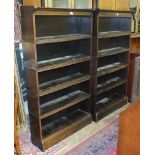 A pair of oak Globe Wernicke-style open bookshelves, each 88cm wide, 158.5cm high, (2).