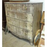 A late-18th century mahogany bow-fronted chest of four long cockbeaded drawers and ebony-lined