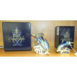 A Royal Crown Derby boxed 'Stripe Dolphin' paperweight and a boxed 'Baby Dolphin', both with gold