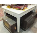 A painted pine kitchen table fitted with two end drawers, on square tapering legs, 137 x 91cm.