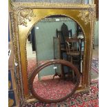 An arched mirror in gilt frame, 101 x 128cm and an oval mirror, (2).