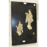 A late-19th/early-20th century Japanese ivory and lacquered panel depicting two female figures,