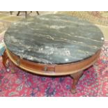A modern circular marble-top low coffee table, 106cm diameter.