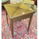 An Edwardian inlaid mahogany envelope-top card table fitted with a frieze drawer, on square tapering