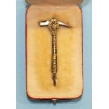 An Italian gilt metal pendant in the form of an ice axe, in fitted leather case labelled 'Romeo