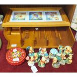 A Danbury Mint 'Winnie The Pooh' perpetual calendar with figures and numbers.
