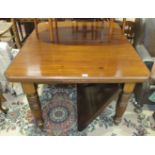 A Late-Victorian mahogany small extending dining table, 105 x 120cm, with spare leaf.