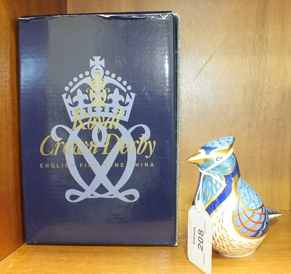 A Royal Crown Derby boxed 'Blue Jay' paperweight, gold stopper.