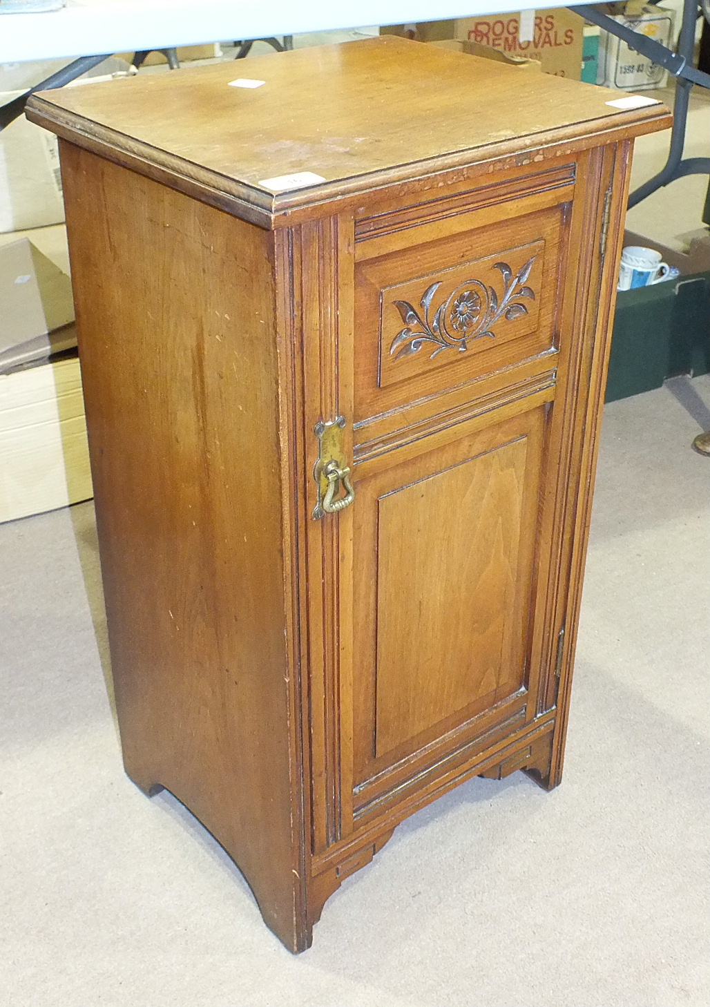 An Edwardian walnut pot cupboard with label for "John Finch & Co, London", 38cm wide, 71cm high.