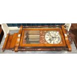 An inlaid stained wood case striking wall clock, (a/f, paint flaking from dial), 94cm high.