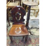 A mahogany carved torchère stand and a Victorian mahogany hall chair, (2).