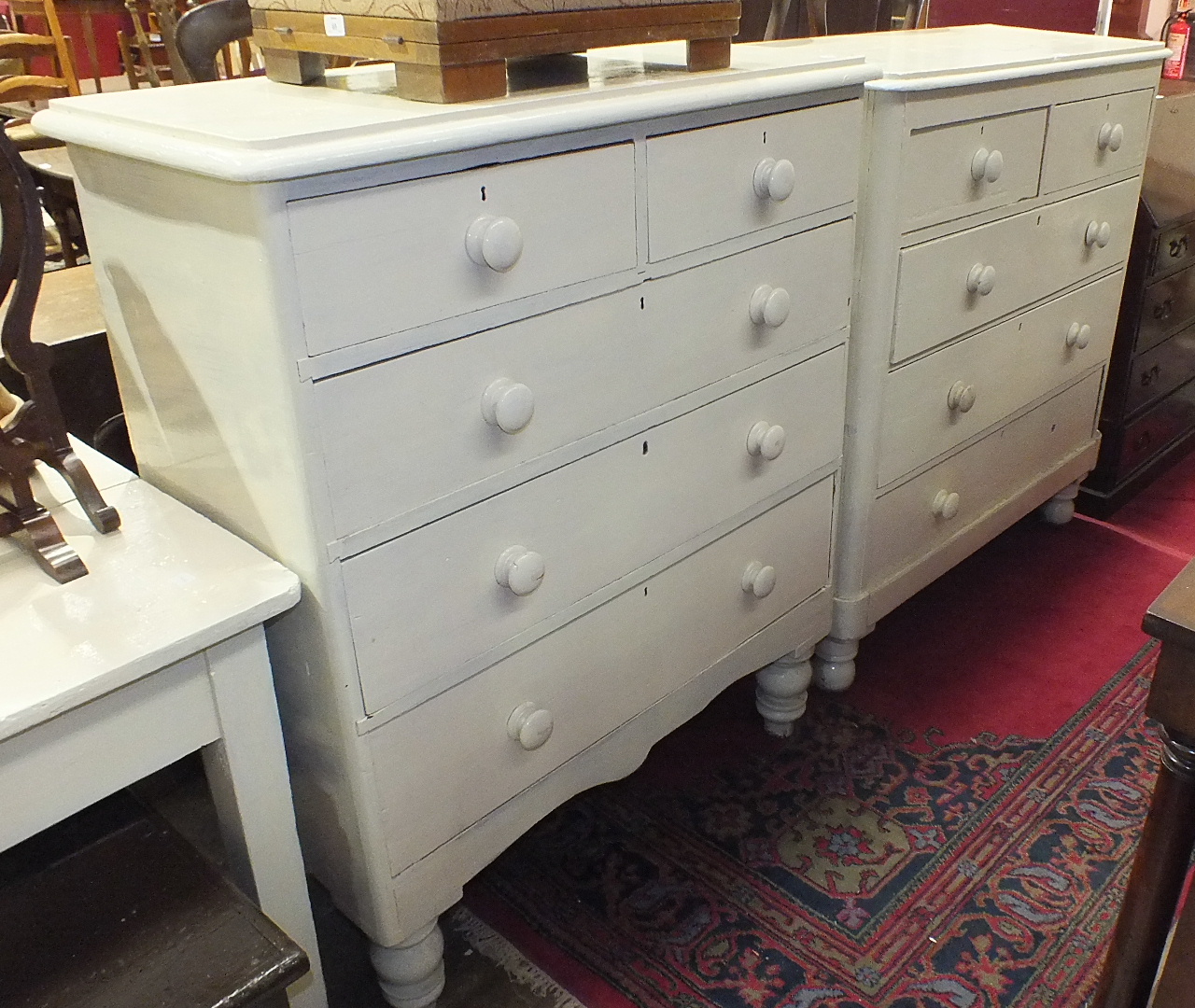 A Late-Victorian painted pine rectangular chest of two short and three long drawers, on turned legs,