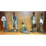 A collection of five resin fashion figurines, tallest 29cm, two marked 'WUL', (5).