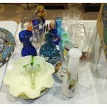 A collection of coloured glassware and various ceramics.