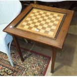 An oak Euchre or Cribbage table with central baize and pierced border score boards, 60cm, a