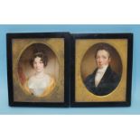 A pair of 19th century miniature portraits of a gentleman wearing a blue coat and white stock and