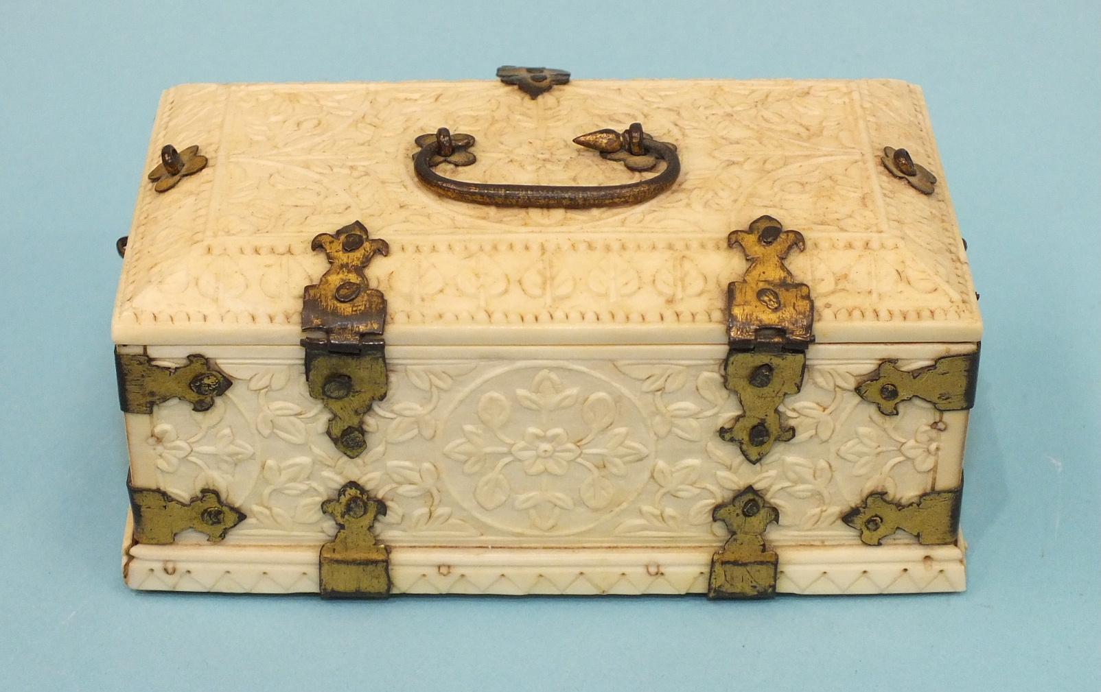 An early-20th century carved ivory and gilt-metal-bound casket carved with overall foliate design, - Image 2 of 5