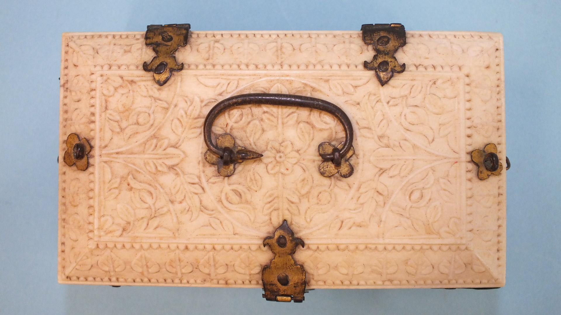 An early-20th century carved ivory and gilt-metal-bound casket carved with overall foliate design, - Image 4 of 5