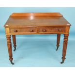 A Victorian mahogany side table, the rectangular top above two frieze drawers, on turned and
