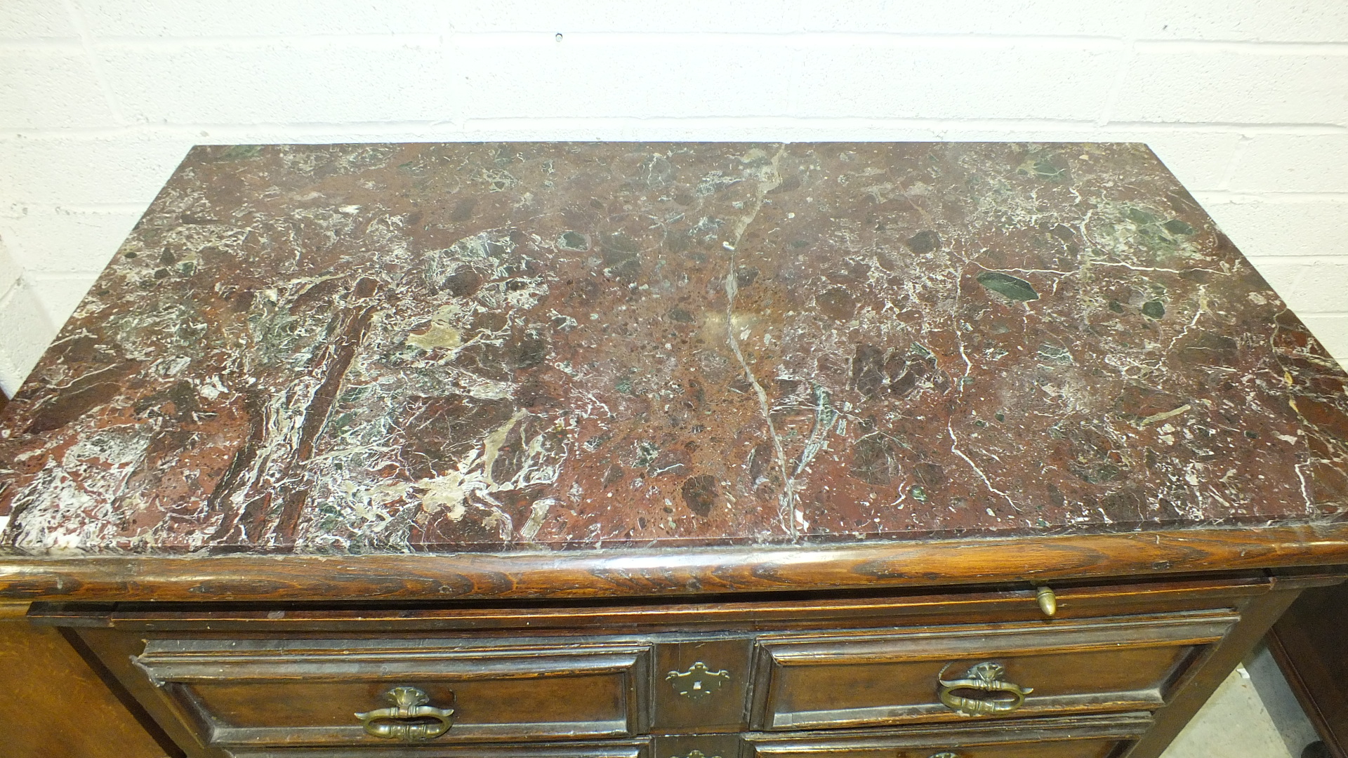 An 18th century Italian chest, the purple marble top (cracked) above a shallow frieze drawer and - Image 2 of 8