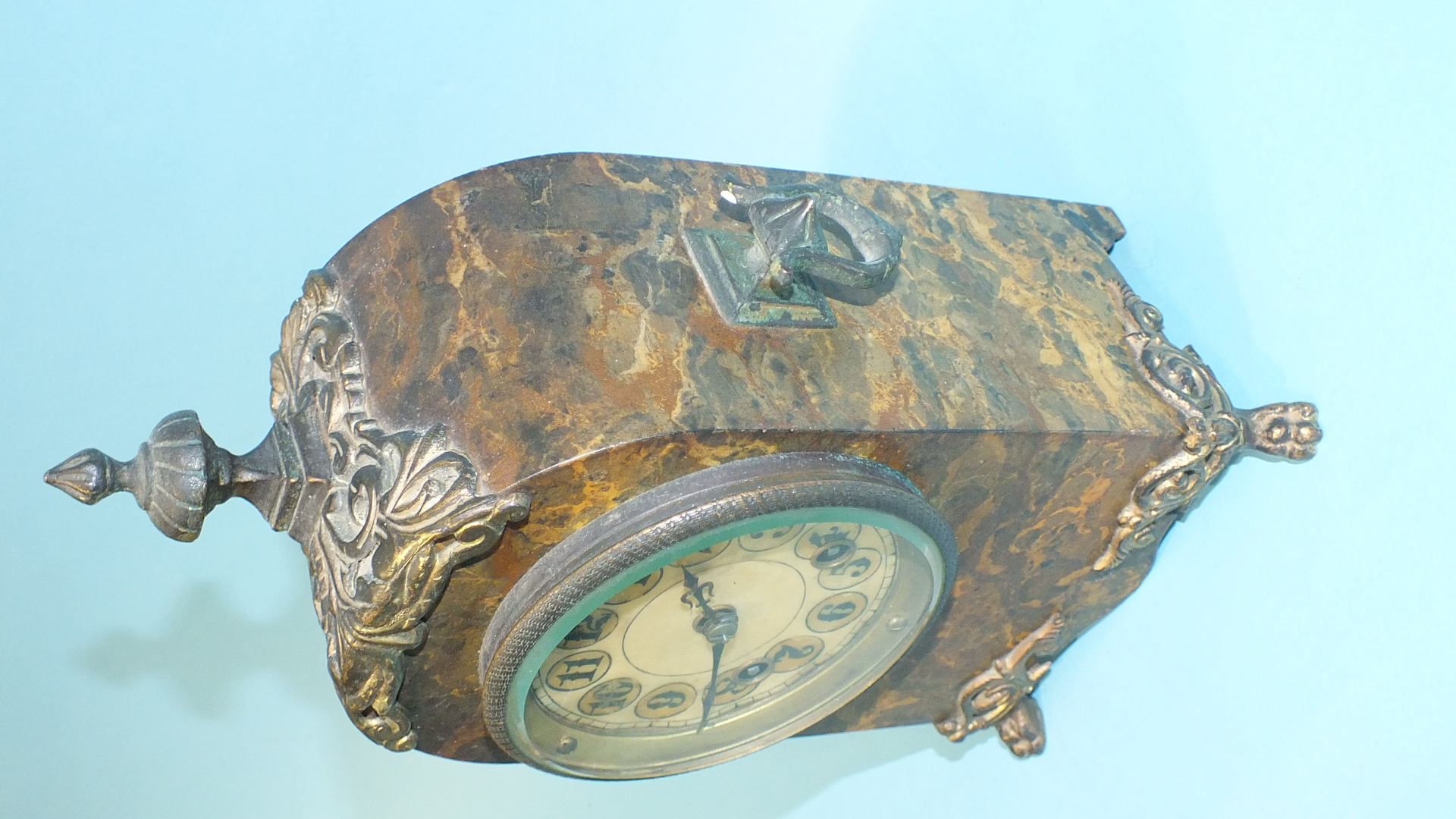 A simulated marble and gilt metal mantel clock of arch form with metal finial, carrying handle and - Image 2 of 5