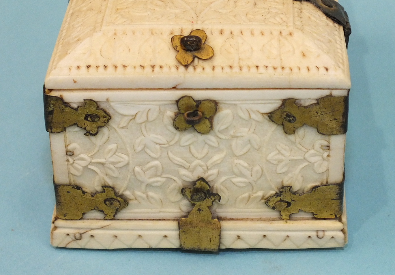 An early-20th century carved ivory and gilt-metal-bound casket carved with overall foliate design, - Image 3 of 5