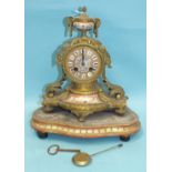 A 19th century French gilt metal and porcelain-mounted mantel clock with part-porcelain urn finial