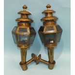 A pair of brass and glass hexagonal-shaped coaching lamps with brackets, 40cm.